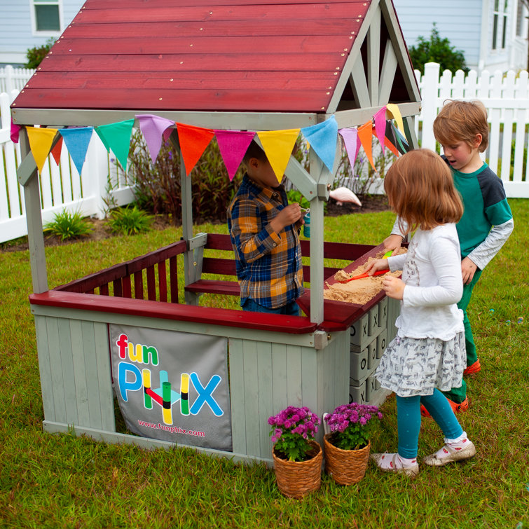 Outdoor playhouse 2024 with sandbox